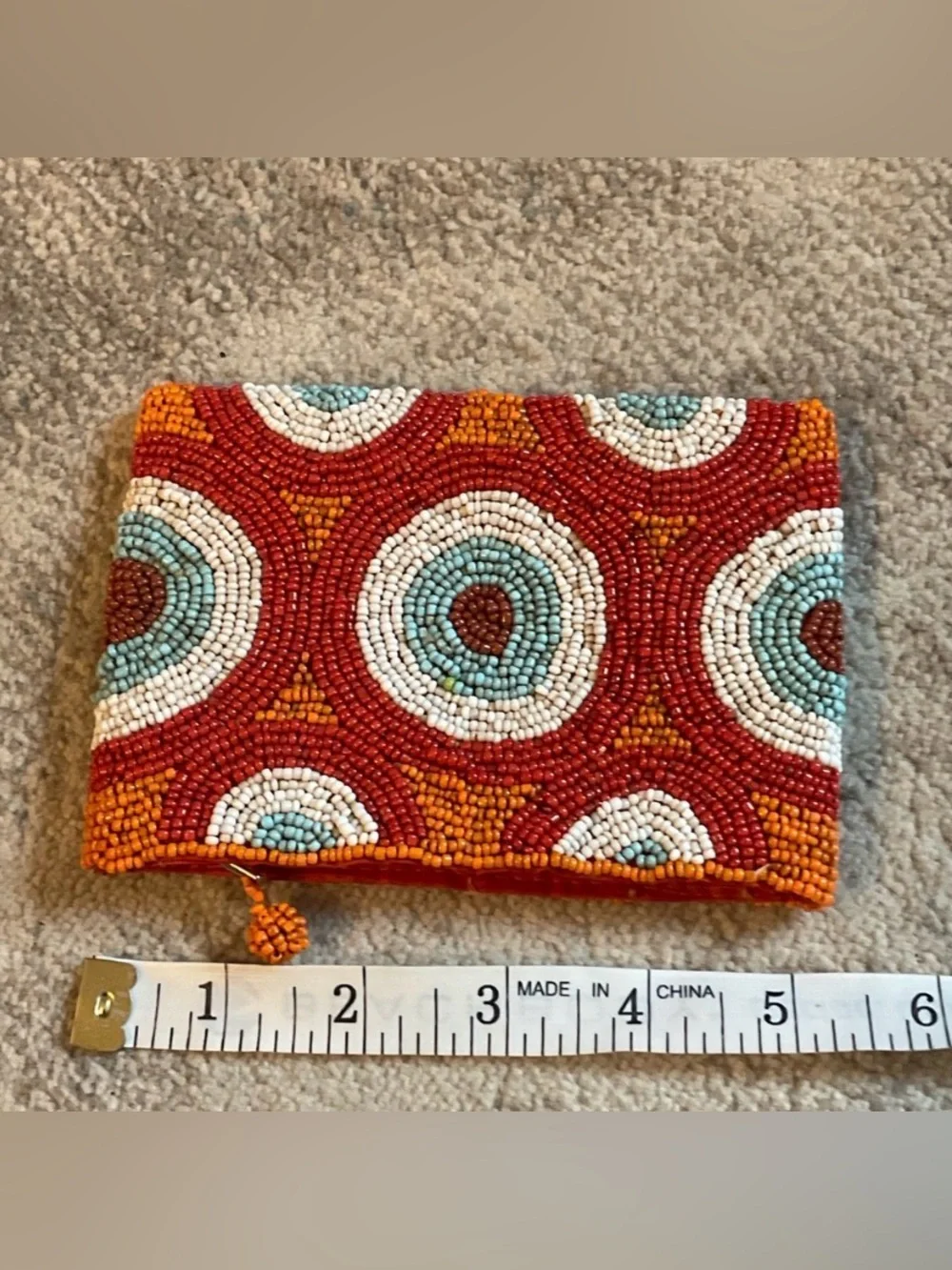 Small hand beaded clutch